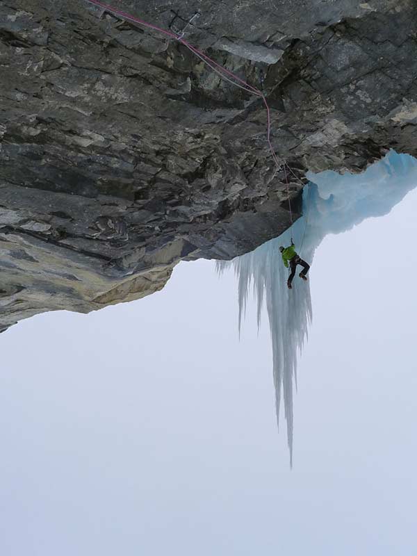 The climber would have the opportunity to place an ice screw in the stump on the right.