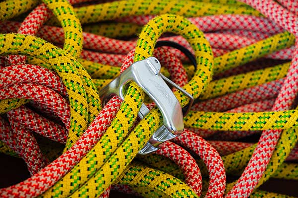 Before the rope is reinserted into the belay device in the spring, it's worth a checkup. Image: Chris Taljaard | Unsplash