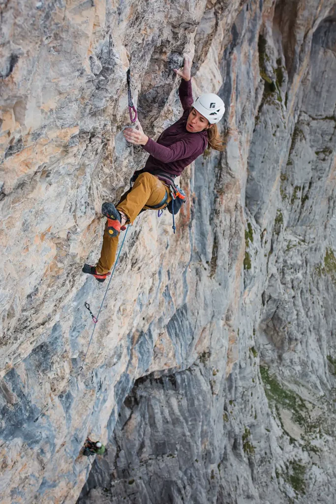 Babsi Zangerl struggles on the difficult and extremely steep multi-pitch route Seventh Direction. Photo: Jacopo Larcher